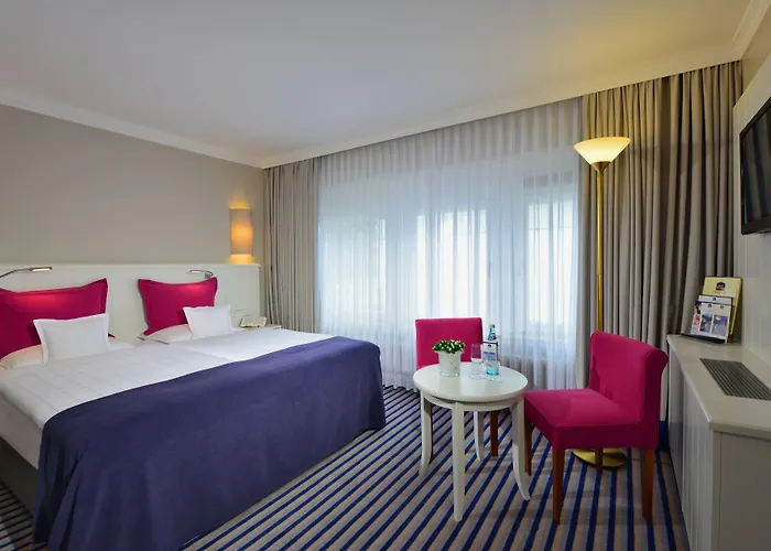 Отель Western Premier Parkhotel Kronsberg 4*
